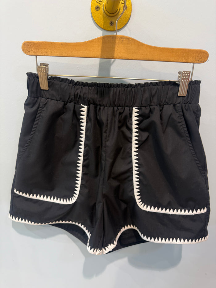 black shorts w/ white stitching detail