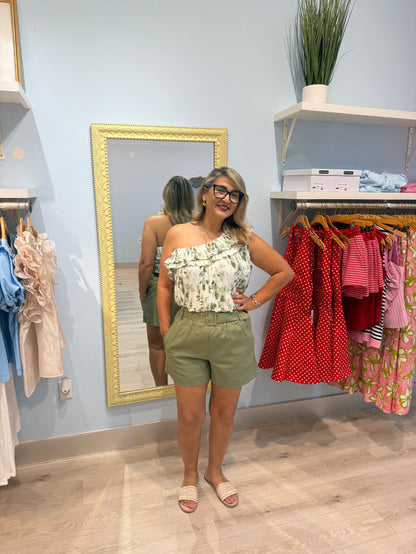 green shorts with matching belt