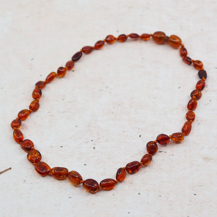 Collier d'ambre pour bébé Olive Cognac