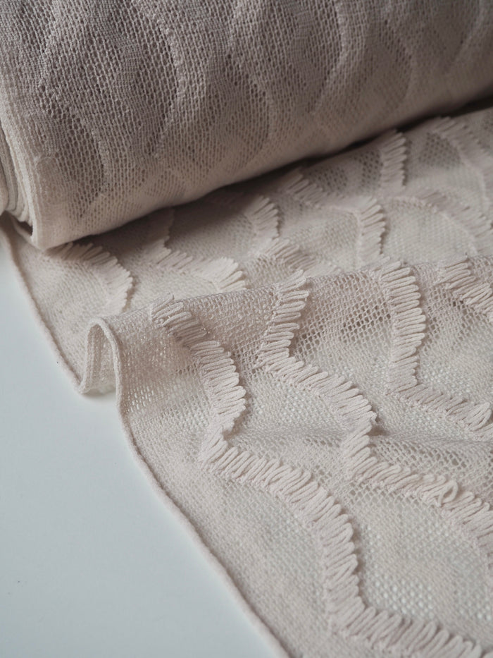 Cream Wave Fringe Knit
