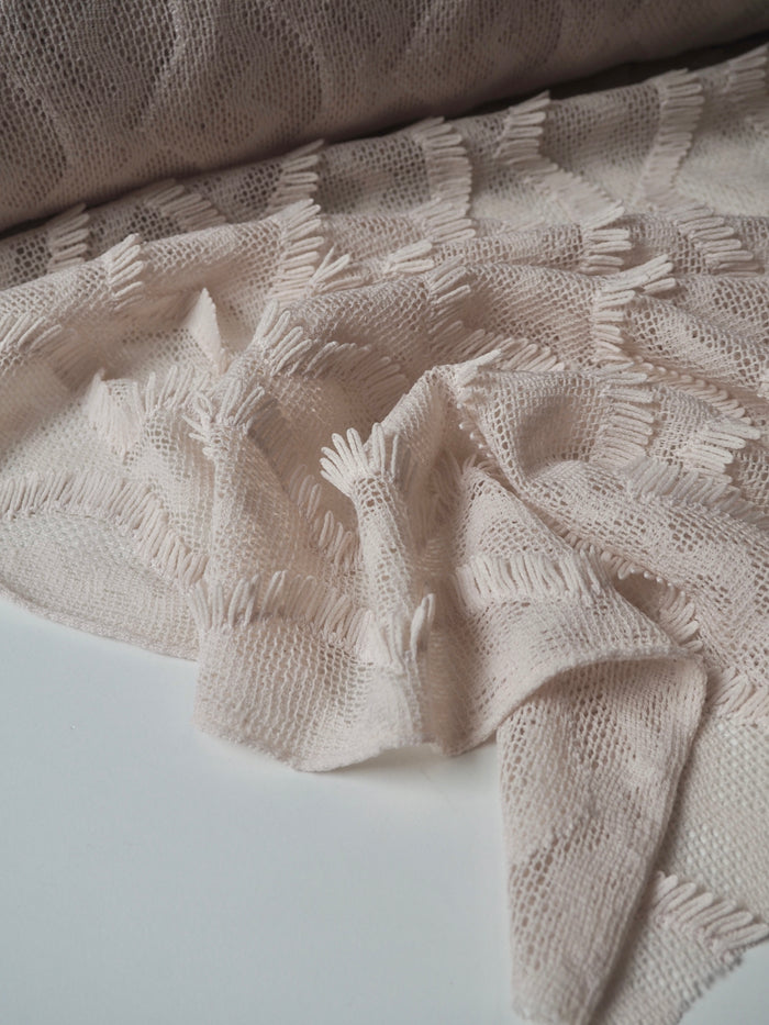 Cream Wave Fringe Knit
