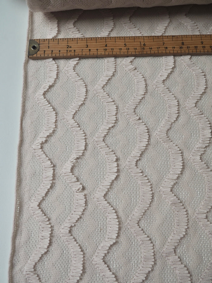 Cream Wave Fringe Knit