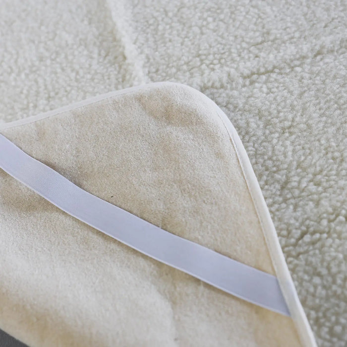 Protège matelas en laine vierge Sassoupi - 90x190 cm