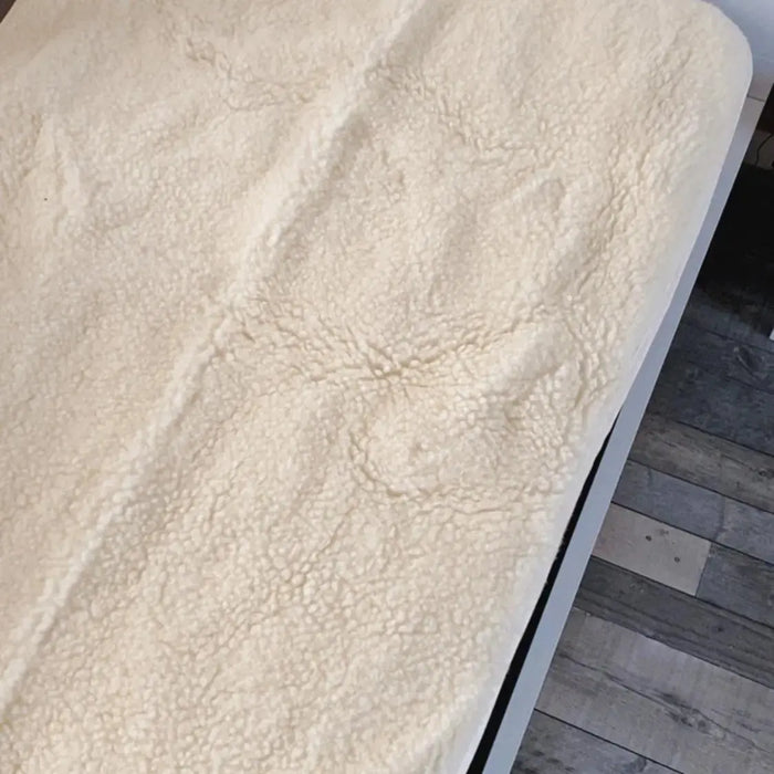 Protège matelas en laine vierge Sassoupi - 70x140cm