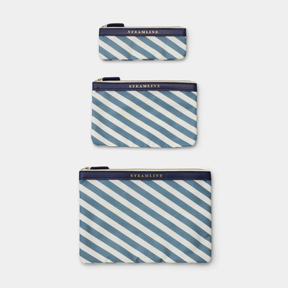 three different sizes of the blue stripe cosmetic cases